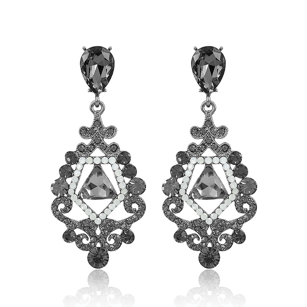 Pendientes de esqueleto de aleación de zinc de dhinestona al por mayor